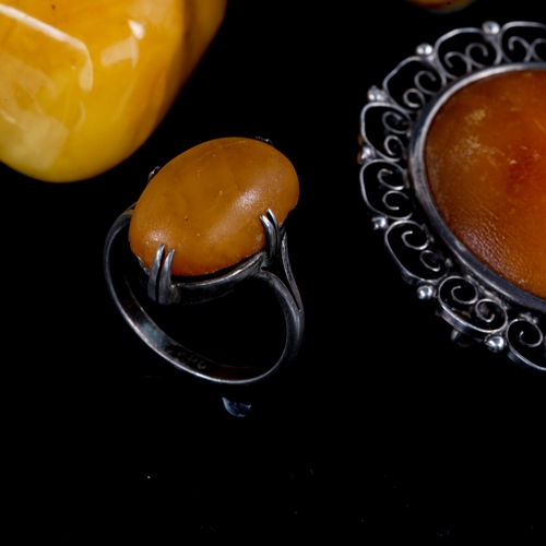 711 - Various Danish Baltic and butterscotch amber jewellery, including rings, pendant and brooch, 34.9g g... 