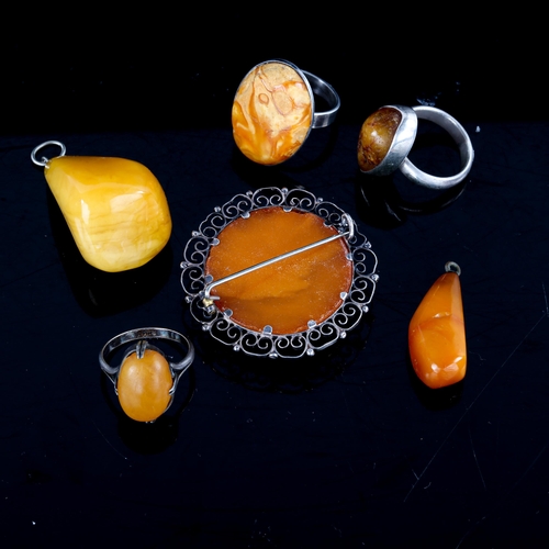 711 - Various Danish Baltic and butterscotch amber jewellery, including rings, pendant and brooch, 34.9g g... 