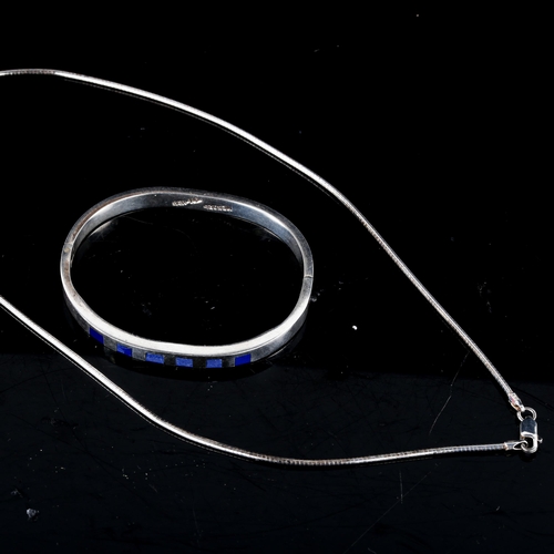 713 - A Mexican sterling silver and blue enamel bracelet, and a modern stylised silver pendant necklace, 4... 