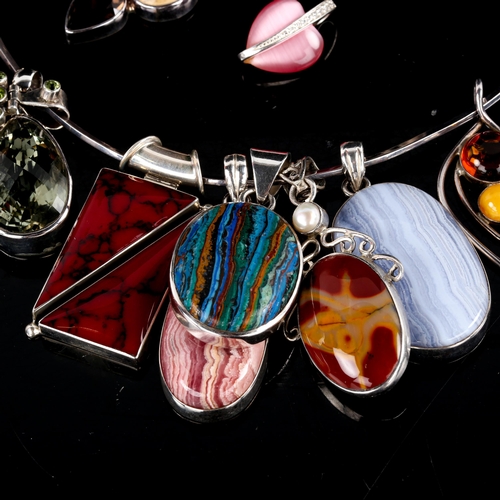 717 - Various modern silver-mounted hardstone and fossil pendants, on silver neck torque