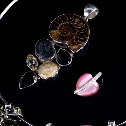 717 - Various modern silver-mounted hardstone and fossil pendants, on silver neck torque