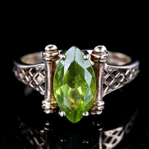 728 - A late 20th century 9ct gold marquise peridot dress ring, with pierced lattice shoulders, hallmarks ... 