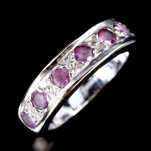 729 - A modern 18ct white gold ruby half eternity ring, set with round-cut rubies, setting height 5.2mm, s... 