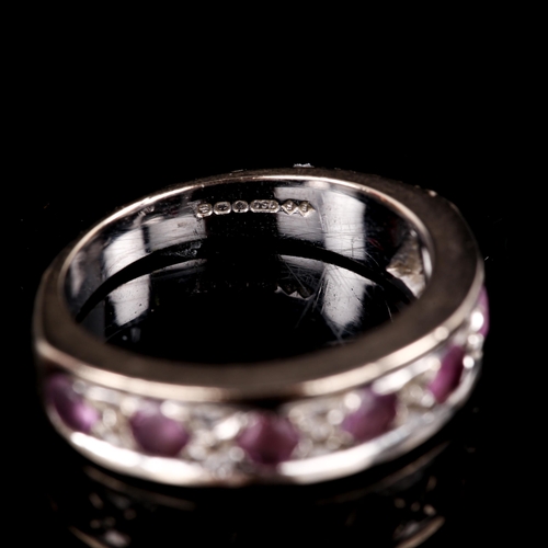 729 - A modern 18ct white gold ruby half eternity ring, set with round-cut rubies, setting height 5.2mm, s... 