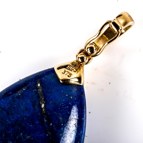 737 - A modern 9ct gold polished teardrop lapis lazuli pendant, pendant height 45mm, 10.2g