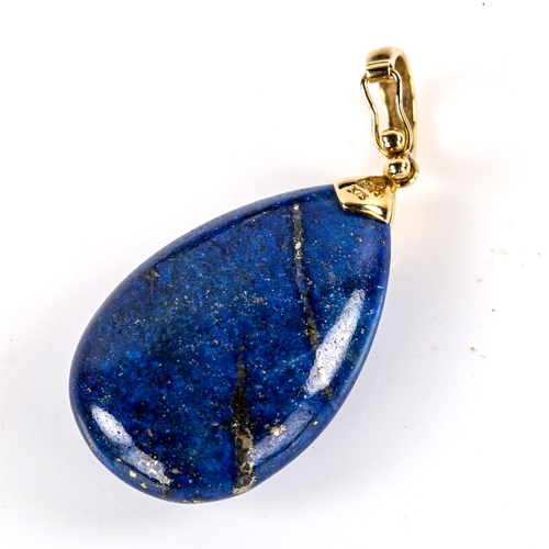 737 - A modern 9ct gold polished teardrop lapis lazuli pendant, pendant height 45mm, 10.2g