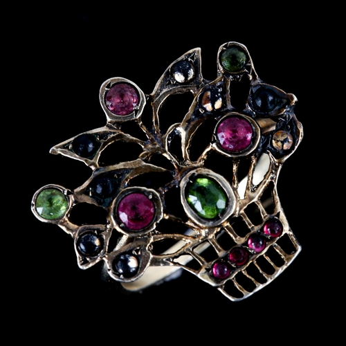 742 - A 19th century German silver-gilt gem set giardinetto ring, basket of flowers set with peridot ruby ... 