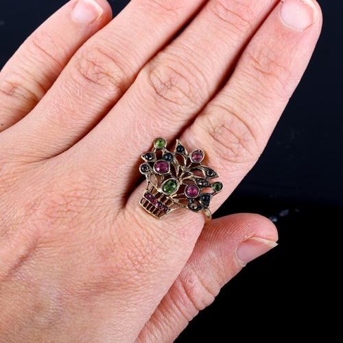 742 - A 19th century German silver-gilt gem set giardinetto ring, basket of flowers set with peridot ruby ... 