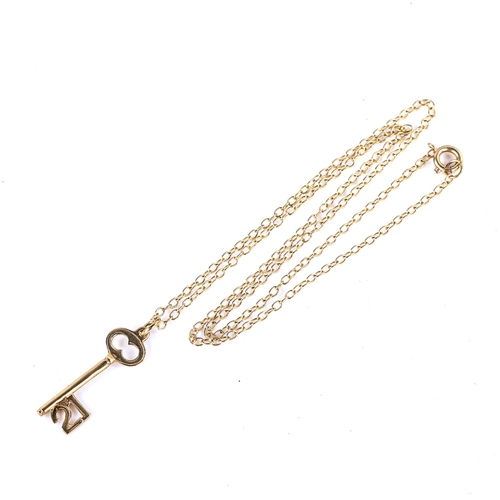 745 - A late 20th century 9ct gold 21st birthday key pendant necklace, on 9ct chain, pendant height 26.4mm... 