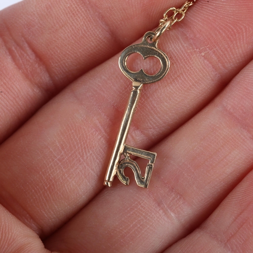 745 - A late 20th century 9ct gold 21st birthday key pendant necklace, on 9ct chain, pendant height 26.4mm... 