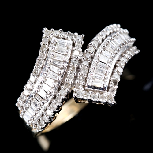 748 - A modern 9ct gold diamond cluster crossover ring, set with baguette and single-cut diamonds, total d... 