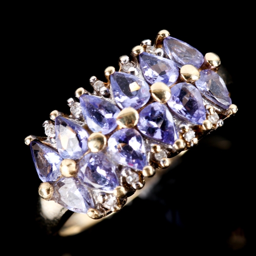 751 - A modern 9ct gold tanzanite and diamond half hoop ring, set with pear-cut tanzanites and single-cut ... 