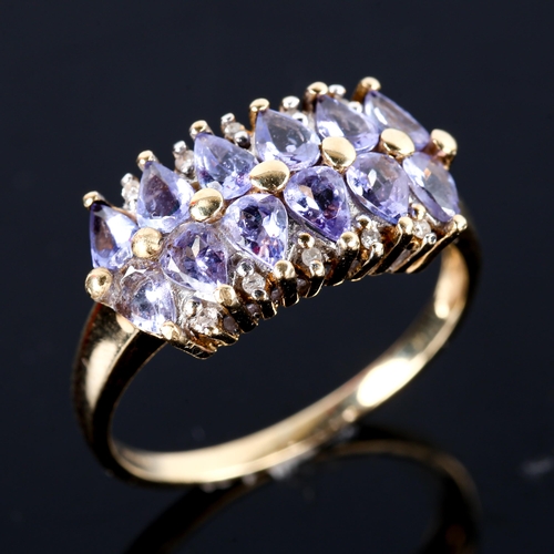 751 - A modern 9ct gold tanzanite and diamond half hoop ring, set with pear-cut tanzanites and single-cut ... 