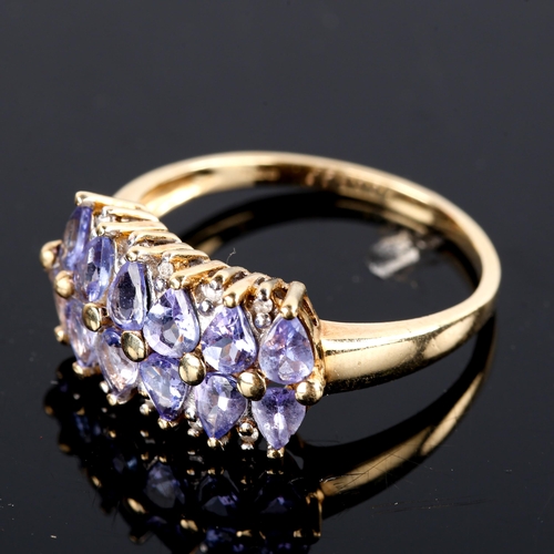 751 - A modern 9ct gold tanzanite and diamond half hoop ring, set with pear-cut tanzanites and single-cut ... 