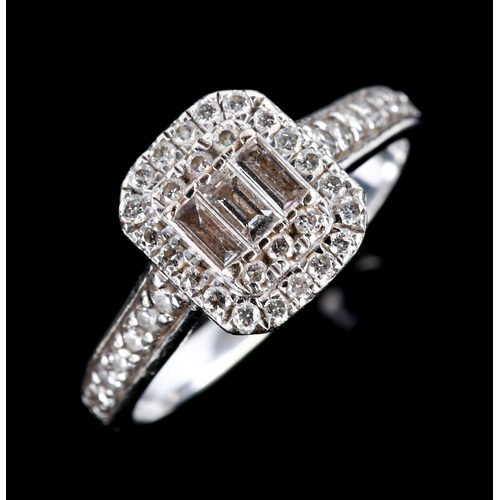 757 - A modern 9ct white gold diamond cluster dress ring, set with baguette and round brilliant-cut diamon... 