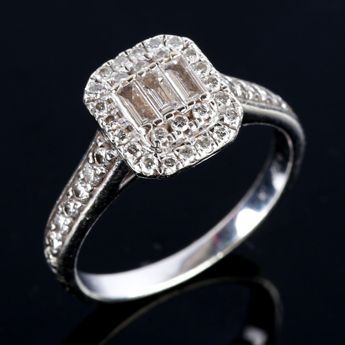 757 - A modern 9ct white gold diamond cluster dress ring, set with baguette and round brilliant-cut diamon... 