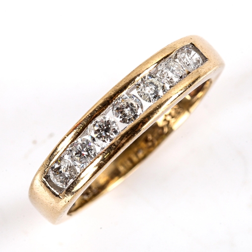 762 - A modern 9ct gold 7-stone diamond half eternity ring, channel set with modern round brilliant-cut di... 