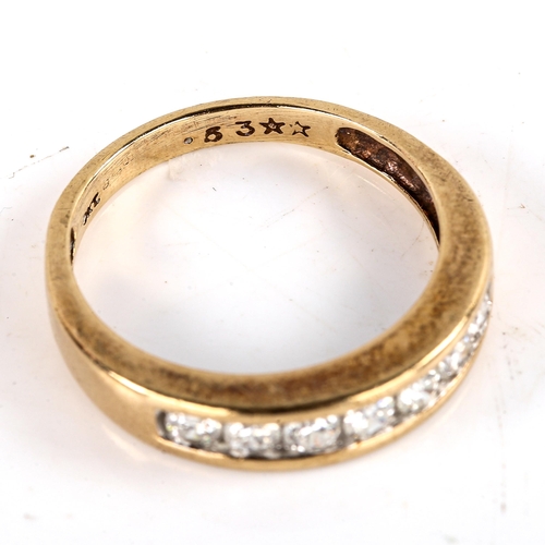 762 - A modern 9ct gold 7-stone diamond half eternity ring, channel set with modern round brilliant-cut di... 