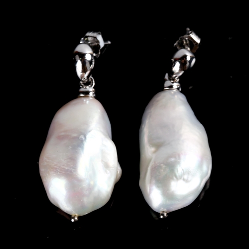 767 - A large pair of sterling silver and baroque cultured pearl earrings, by Gemporia, earring height 37.... 