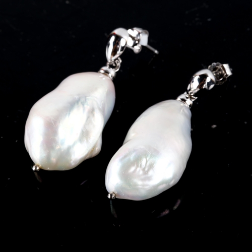 767 - A large pair of sterling silver and baroque cultured pearl earrings, by Gemporia, earring height 37.... 