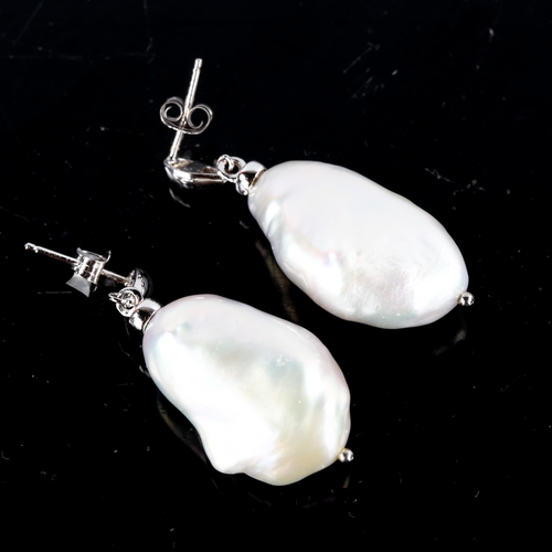 767 - A large pair of sterling silver and baroque cultured pearl earrings, by Gemporia, earring height 37.... 