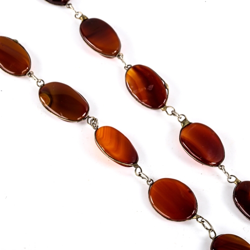 768 - A large polished carnelian tablet pendant necklace, necklace length 66cm, 82.5g