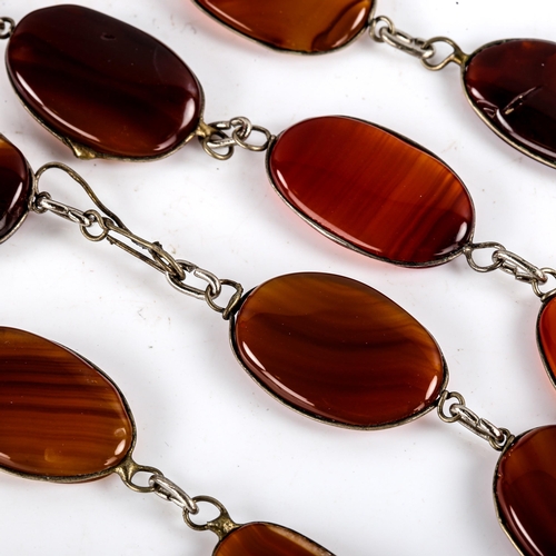 768 - A large polished carnelian tablet pendant necklace, necklace length 66cm, 82.5g