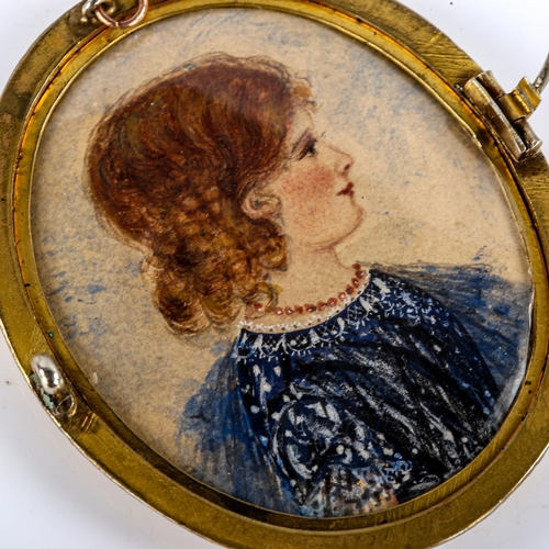 773 - A Georgian double-sided hand painted miniature portrait brooch, in gilt-metal frame, brooch height 6... 