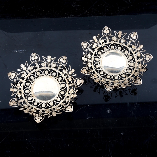 775 - A cased pair of Indian silver dishes, openwork decoration, diameter 14cm, 4.4oz, in Bartons of Banga... 