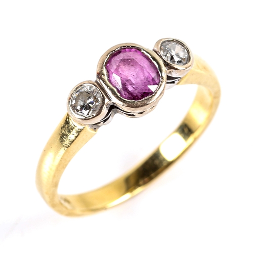 783 - A modern 18ct gold 3-stone ruby and diamond dress ring, bezel set with oval mixed-cut ruby and round... 