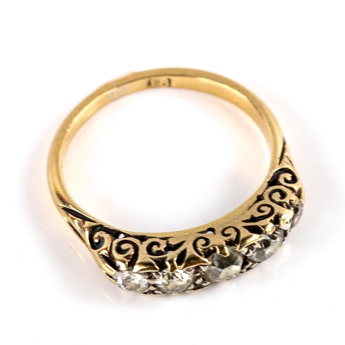 786 - An early 20th century 18ct gold graduated 5-stone diamond half hoop ring, set with old European-cut ... 