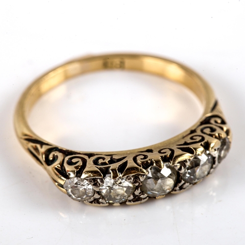 786 - An early 20th century 18ct gold graduated 5-stone diamond half hoop ring, set with old European-cut ... 