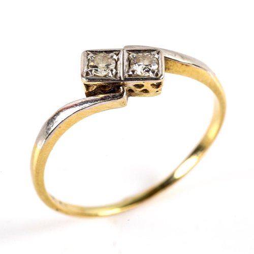 788 - An early 20th century 18ct gold 2-stone diamond crossover ring, platinum tops with round-cut diamond... 