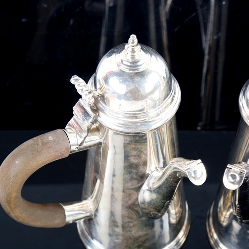 792 - A pair of George V silver cafe au lait pots, in 18th century side pouring style, tapered cylindrical... 