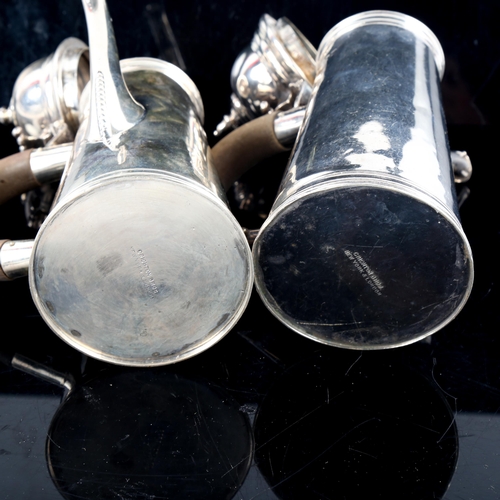 792 - A pair of George V silver cafe au lait pots, in 18th century side pouring style, tapered cylindrical... 