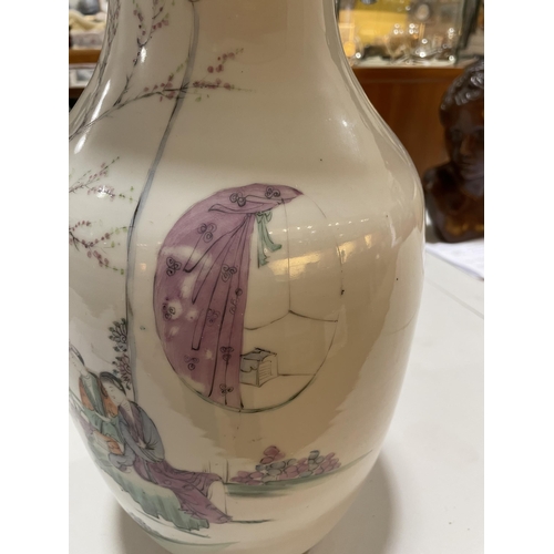 174 - A Chinese white glaze porcelain vase, hand painted ladies in gardens with lines of text, height 43cm... 