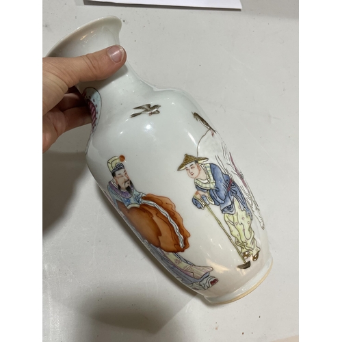 193 - A Chinese white glaze porcelain vase, with painted Court figures, height 23.5cm