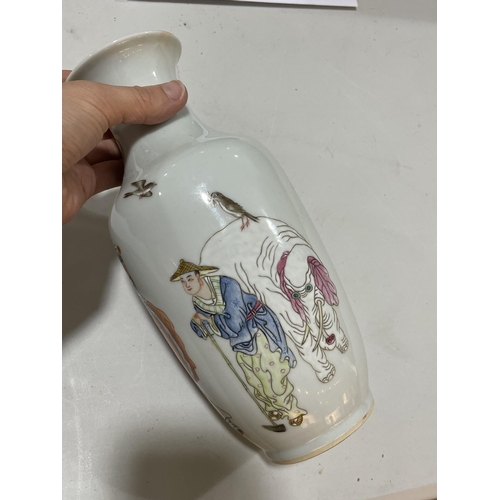 193 - A Chinese white glaze porcelain vase, with painted Court figures, height 23.5cm