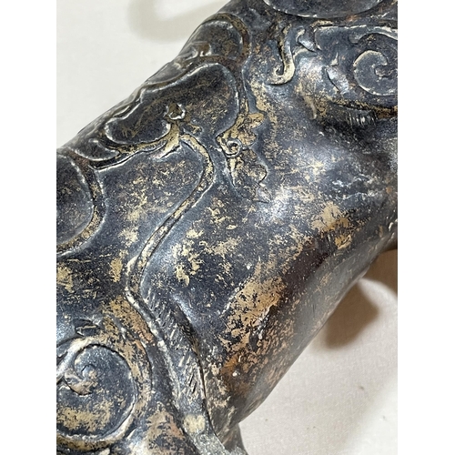 234 - A gilt patinated bronze bull, with relief moulded surface decoration, length 18cm