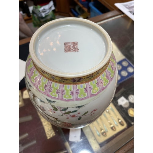 195 - A Chinese white glaze porcelain vase, finely painted enamel flowers with yellow ground neck, seal ma... 