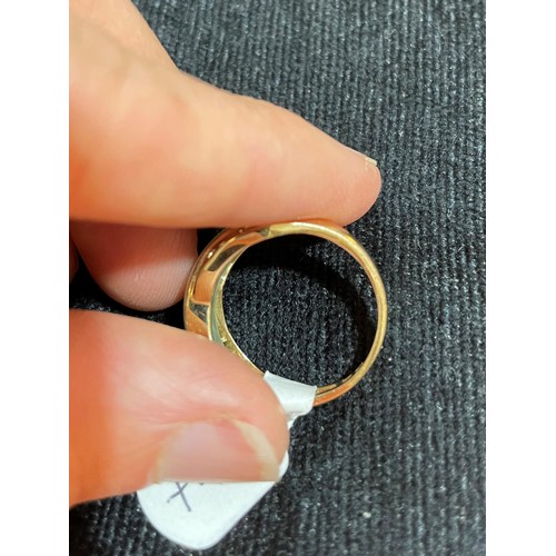 743 - A modern 9ct gold jade dress ring, with pierced Greek key shoulders, setting height 7.8mm, size M, 2... 