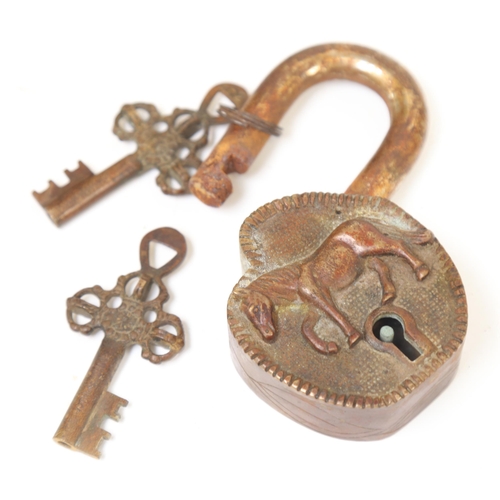 120 - An Antique brass and steel lock, with horse decoration and 2 keys, overall length 11cm