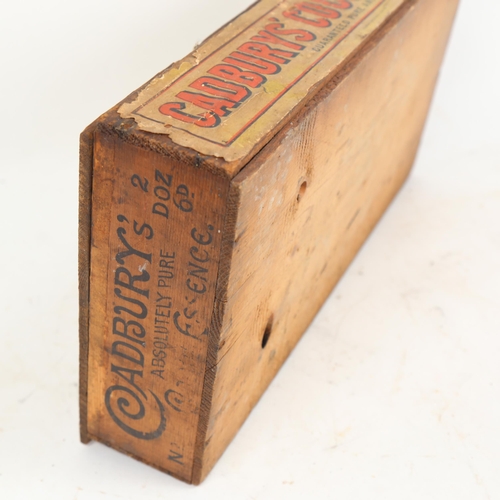 74 - An Antique Cadbury's Cocoa Essence pine adverting display box, W39cm, H8cm, D22cm