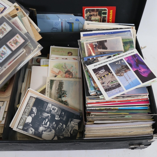 96 - A large quantity of Vintage loose postcards, postage stamps and ephemera