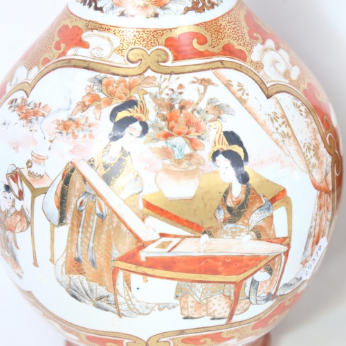 183 - A large pair of Japanese Imari style narrow-neck vases, figural and floral decoration, with marks on... 