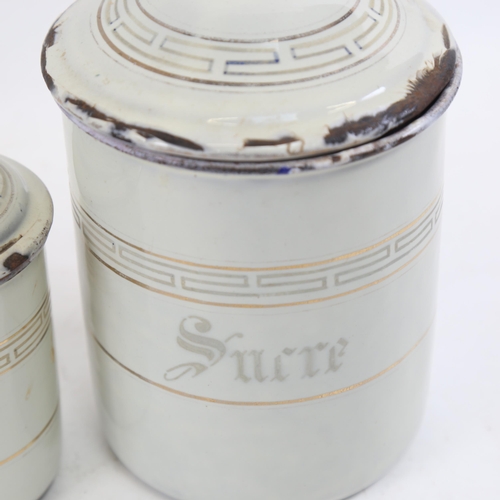 317 - A 19th century French enamelled kitchen storage jar set, largest height 20cm