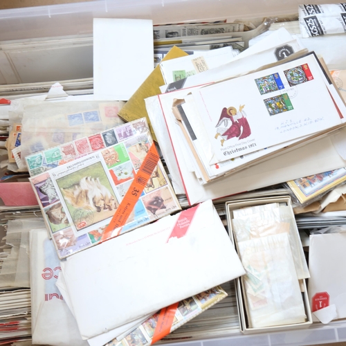 385 - A large boxful of various postage stamps, including sets and Mint