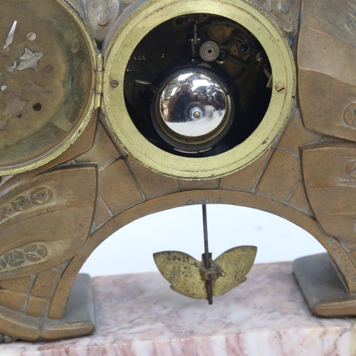 395 - A French Art Deco gilded spelter 8-day mantel clock, maker JR of Paris, on pink veined marble plinth... 