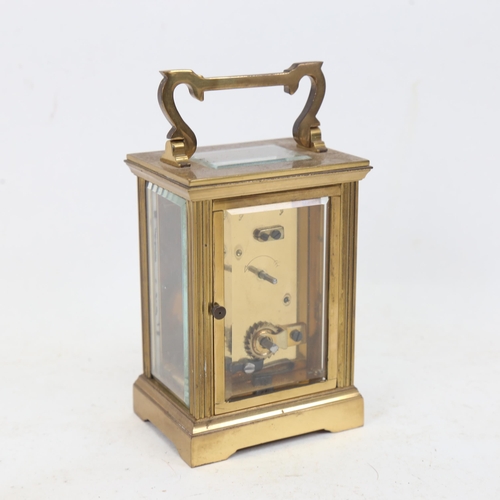 401 - A brass-cased carriage clock, height 14.5cm