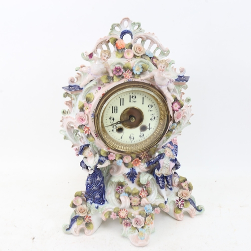 409 - A large Vintage Continental porcelain-cased 8-day mantel clock, with applied figures and flowers, an... 